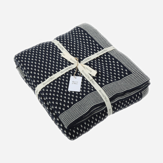 Folded Arrow Heads 100% cotton knitted throw in Indigo / Ecru with ribbon detail