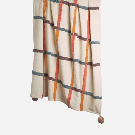 Hanging Chequered Pom Pom 100% cotton woven throw in Orange and Blue