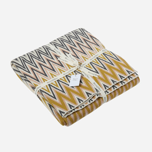 Folded Herringbone 100% cotton knitted throw in Ecru/Anthracite/Honey/Macadamia/Maroon/Grey with ribbon detail