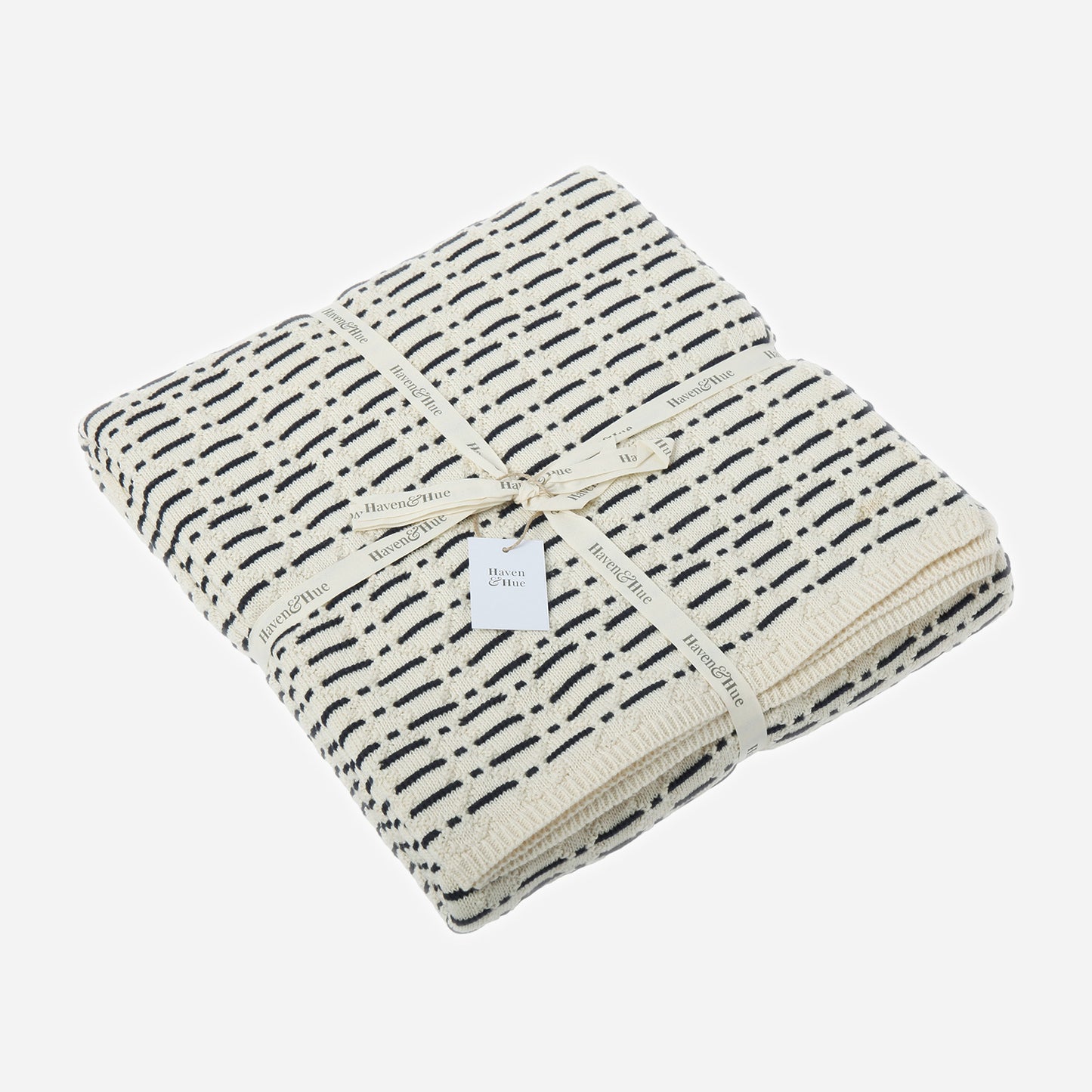 Folded Interwoven 100% cotton knitted throw in Indigo / Ecru with ribbon detail