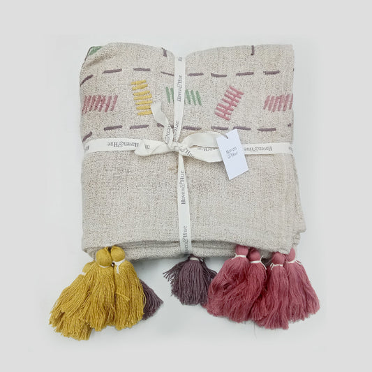 Folded Multi coloured 100% cotton woven throw with tassels & embroidery detail