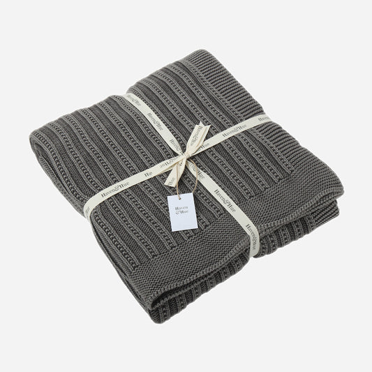Folded Ridge Lines 100% cotton throw in Black Acid Wash with ribbon detail