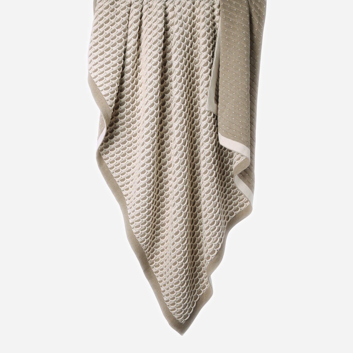 Hanging Scallops 100% cotton knitted throw in Natural Melange / Ecru showing reversible sides