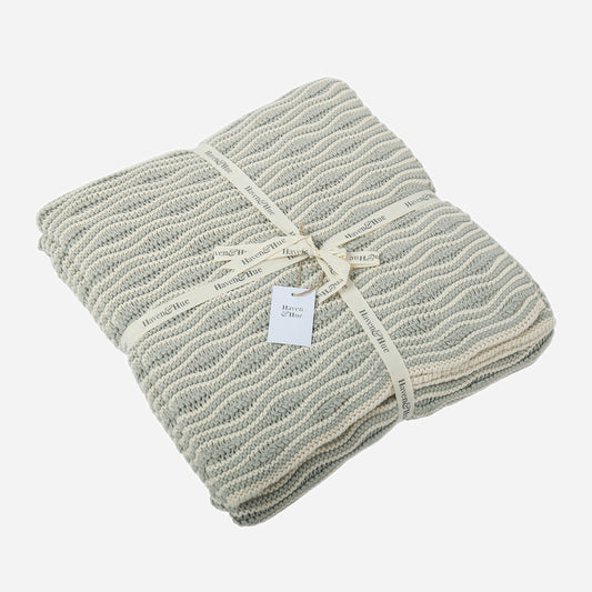 Folded Waves 100% cotton knitted throw in Grey / Ecru with ribbon detail